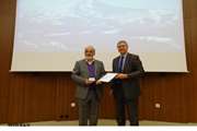 Donation of honorary medal of international agency in research cancer to deputy health minister